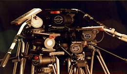 Photo of professional tripods together